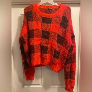 Red and black sweater